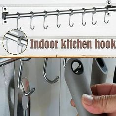 a person is opening the kitchen hooks