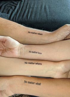 three people with matching tattoos on their arms