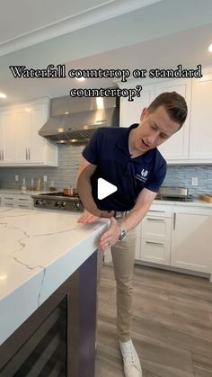 a man standing at a counter in a kitchen with the caption, what's your countertop or standup?