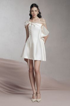 This dress features a flattering A-line silhouette and an asymmetric one-shoulder design. The chiffon material adds a touch of elegance and the asymmetric shoulder adds a unique twist to the overall look. Perfect for any special occasion, this dress combines style and comfort effortlessly.  * Product length is measured from the shoulder of the product.