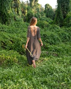 🌿One of my first and favourite dress, comfy, wide, nice Indian style back, down part is wide enough to seat ore to dance ore whatever😉, with 1 big pocket outside, colour is between brown and grey, made of raw cotton Khadi, breathing and natural, pure joy for the body and soul🍀 Fitting good different sizes of the bodies🌿 Brown Cotton Bohemian Maxi Dress, Bohemian Brown Linen Dress, Floor-length Boho Print Hippie Dress, Bohemian Brown Floor-length Maxi Dress, Bohemian Linen V-neck Beach Dress, Cotton Long Dress, Big Pocket, Ladies Dress, Grey Colour