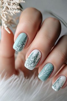 Get lost in the snowy forest with these gorgeous winter tree designs. Soft sage and white accents make these perfect for a natural winter nail vibe. Great for short or medium-length nails. Save this winter nail art idea and check out nailhow.com for more winter nails inspo! Nails Design Winter 2024, Holiday Nails Snowman, Christmas Design For Nails, Winter Nails Coffin Short, Diy Winter Nail Art, White Christmas Tree Nail Art, Florida Christmas Nails, White Snowy Nails, Christmas Tropical Nails