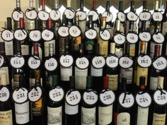 many bottles of wine are arranged in rows