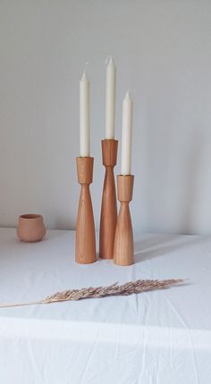 A wonderful  decoration of any holiday and festive events. Set of 3 wooden candle holder.  Hand-crafted from solid cherry wood. Their unique texture makes them truly unique. Wooden candlesticks will become a wonderful aesthetic component of your home, fill it with the energy of beauty, creative energy, and will create coziness in the house. They will be ideal as a holiday gift for friends and relatives. The texture of the candlestick can change and never repeat itself, each candlestick is unique Pilar Candle Holders, Pilar Candles, Wooden Candlesticks, Home Table Decor, Rustic Candle, Scandinavian Style Home, Wooden Candle Holder, Rustic Candle Holders, Wooden Candle Sticks