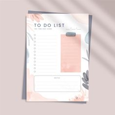 a to do list on top of a pink and blue flowered sheet of paper