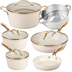 white and gold cookware set with golden trimmings on the bottom, side, and top