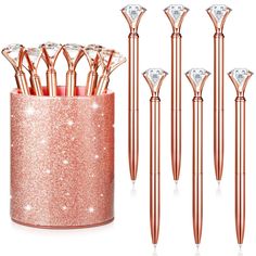 PRICES MAY VARY. Get: package contains a bling bling rose gold leather pen holder and 6 diamond pens in rose gold color, put them together on your desk to make your desk look stylish and attractive Stylish Office Set: the glitter storage pen holder in solid color with shiny elements is made of PU leather; These diamond pens are made of colored metal, decorated with stunning metal finishes and accessories, the top is decorated with large diamond shaped crystals clamped by the tip, looks more brig Pencil Holders For Desk, Rose Gold Pen, Organizer Makeup, Rose Gold Marble, Diamond Pen, Gold Pen, Makeup Brush Holder, Pencil Cup, Golden Pattern