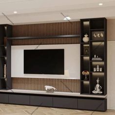 a living room with a large television on the wall and shelves in front of it