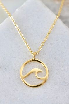 Wave Necklace from Southern Sunday Ocean-inspired 14k Gold Jewelry, Ocean-inspired Gold Round Pendant Jewelry, Gold Ocean-inspired Round Pendant Jewelry, Gold Ocean-inspired Charm Necklaces As Gift, Gold Ocean-inspired Charm Necklace For Gift, Ocean-inspired Gold Charm Necklace For Gift, Gold Ocean-inspired Pendant Jewelry, Ocean-inspired Gold Pendant Jewelry, Ocean-inspired Round Gold Necklace