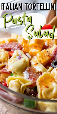 pasta salad with italian tortellini sauce in a glass bowl