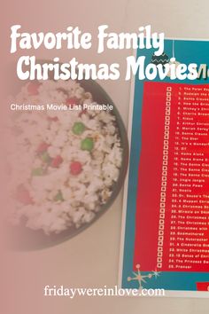 a bowl of popcorn next to a christmas movie list with the words favorite family christmas movies on it