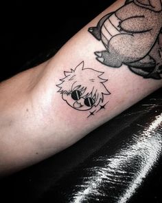 a person with a tattoo on their leg