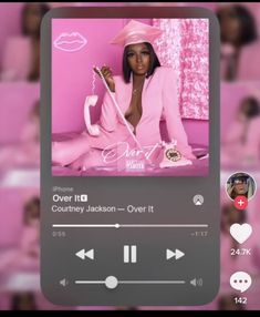 the music player is playing her album on her cell phone, and it's pink