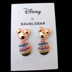 disney x baublebar mickey mouse earrings with multicolored glitters on them