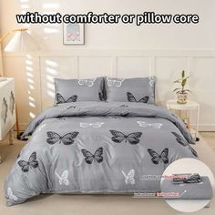 the comforter or pillow cover is grey with butterflies on it