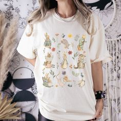 Check out this sweet Peter Rabbit & friends shirt. This comfy Beatrix Potter shirt design captures themes from the beloved children storybooks. With a fun garden party theme, you can't go wrong. You will love this adorable book lovers tee!  💖 Care Instructions 💖 Please use laundry detergent and warm water to clean you soft style shirt.  Do not bleach Tumble dry 💖 Production & Shipping 💖 Processing time: approximately 1-3 days. Shipping time: approximately 2-5 days (Depending on where you liv Garden Party Theme, Peter Rabbit And Friends, Kids Story Books, Beatrix Potter, Peter Rabbit, Friends Shirt, Garden Party, Shirt Style, Personal Style