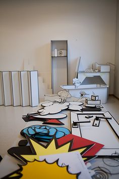 an empty room with various cut outs on the floor