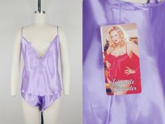 "1990s pajama/lounge set ~Lavender purple satin ~Slip on style camisole with adjustable straps ~Elastic waist shorts Condition: Excellent to mint. Set is new old stock and unworn with tags Size: Marked 3X *please consult measurements to ensure fit *Please note: set was photographed on a size 0 dressform and pinned to fit. Proportions/fit may vary some from photos. Nightie top Bust: 49-53\" Length: 21\"(adjustable with straps) Shorts Waist: 32.5-44\" Hip: Approximately 55\"(somewhat free due to s Satin Pyjama, Satin Pajama Set, Pajama Lounge, Satin Pajama, Satin Pyjama Set, Purple Satin, Sleepwear & Loungewear, Womens Pyjama Sets, Satin Pajamas