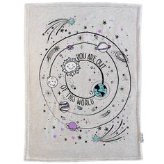 a white blanket with the words you are all in this world on it and stars