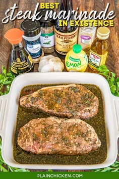 steak marinara sauce in a white casserole dish with herbs and seasonings