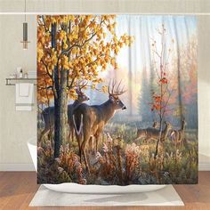 a shower curtain with deer in the woods on it's side and trees behind it