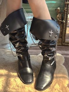 Step into the dark allure of Gothic fashion with our Skeleton Hands and Crosses Punk Chunky Heel Boots. The chunky heel offers both style and comfort, while the intricate skeleton hand and cross motifs add an edgy, rebellious touch. Adorned with chains, these boots exude a punk rock vibe that is perfect for those who dare to stand out. Garment Size Size3536373839Foot Length22.523.023.524.024.5Heel55555 Pirate Boots Aesthetic, Celnepho Goth Boots With Harness, Punk Black Lace-up Boots With Reinforced Heel, Gothic Heels, Punk Knee-high Boots For Alternative Fashion, Goth Boots With Chains, Punk Ankle-high Heeled Boots With Reinforced Heel, Pirate Boots, Gothic Mode