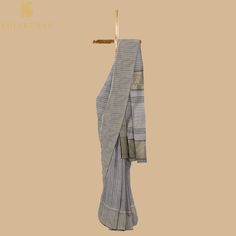 Khinkhwab brings you Maheshwari Sarees. Maheshwari handlooms owe their name to Maharani Ahilyabai Holkar, the ruler of the state of Indore in the late 18th century. Her reign was deemed the Golden Age, and she is revered by all at Maheshwar as Devi Ahilyabai or Ma Saab till date. Maheshwari handlooms derived their fine simplicity from this icon. It is said that under her artistic guidance, the craftspeople made light fabrics, detailed with motifs derived from carvings on the Maheshwar fort- a de Transitional Cotton Silk Traditional Wear For Rituals, Transitional Season Handloom Pre-draped Saree For Traditional Ceremonies, Traditional Cotton Pre-draped Saree With Dupatta, Handloom Cotton Silk Traditional Wear For Rituals, Cotton Silk Traditional Wear With Weaving Work For Rituals, Cotton Silk Dupatta With Weaving Work For Rituals, Cotton Dupatta For Rituals And Transitional Season, Traditional Cotton Silk Pre-draped Saree With Weaving Work, Cotton Handloom Saree For Rituals