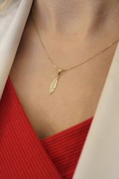 "ABOUT PRODUCT This 14K Gold Feather Charm necklace is beautifully designed and hand crafted with our associates to make this a special gift for your loved ones. Knowing the value of our customers, We prepare each piece with extra care and attention.  ITEM DETAILS Material: 14K Gold Approx:  1.65 gram Available colors: Gold, Rose Gold, White Gold Available Sizes: 14\" to 20\" ✪ 14k Solid Gold ( Certification will be included with your order ) ✪Available 14K White, Yellow, Rose Gold (also in 10, Luxury Wedding Necklaces With Charms, Elegant Custom Necklace With Large Pendant As Gift, Elegant Charm Necklace For Wedding, Handmade Yellow Gold Necklaces For Wedding, Handmade Fine Jewelry Necklace For Formal Occasions, Handmade Yellow Gold Necklace For Wedding, Handmade Wedding Pendant Necklace, Handmade 14k Gold Pendant Necklace, Handmade Fine Jewelry Wedding Necklaces