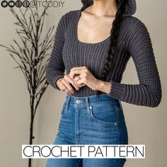 a woman wearing a gray sweater and jeans with the words crochet pattern on it