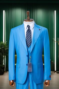 *We are proud to offer a wide range of high-quality men's suits. Each piece is carefully crafted to offer you the best possible experience, whether it's for casual wear or corporate business wear. *This suit delivers luxury. Made with only the finest fabrics, it will create a look of elegance and luxury you'll be proud to wear anywhere. *Each suit exudes the characteristics of its owner. Whether it's the sophisticated and modern style or the powerful and adventurous look, each and every suit is Classic Blue Three-piece Suit With Pockets, Classic Blue Three-piece Suit, Business Sets With Pockets In Solid Color, Professional Solid Color Single Button Suit, Professional Solid Color Business Sets, Professional Business Sets In Solid Color, Blue Suits With Pockets, Blue Single-button Suit, Blue Business Sets With Pockets