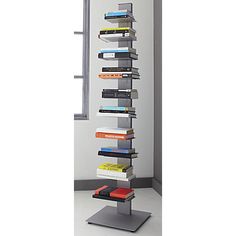 a tall book shelf with many books on it