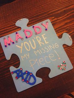 a piece of puzzle that says, daddy you're missing piece