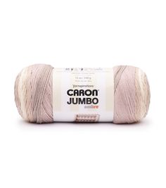 a ball of yarn that is pink and white with the words carbon jumbo written on it