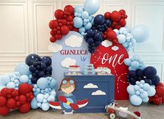 an airplane themed birthday party with balloons and decorations