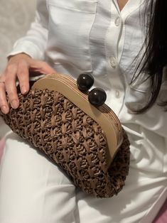 Crochet Bags With Wooden Handles, Chic Woven Crochet Satchel Bag, Chic Brown Crochet Bag With Leather Handles, Brown Leather Clutch With Braided Handles For Daily Use, Chic Knitted Shoulder Bag, Elegant Brown Crochet Bag For Travel, Chic Knitted Bags For Everyday Use, Brown Clutch With Braided Handles For Everyday Use, Elegant Brown Crochet Travel Bag