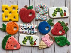 the very many decorated cookies are on the table