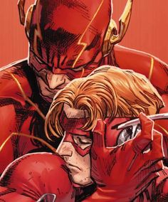 the flash and cy - man are hugging each other