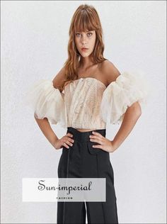 Gender: WomenMaterial: COTTONMaterial: PolyesterClothing Length: ShortStyle:VintageFabric Type: WovenSleeve Length(cm): HalfDecoration: RufflesPattern Type: SolidCollar: Slash neckSleeve Style: Flare SleeveSIZES:Bust:78cm,Sleeve length:24cm,Length:15-25cm,Waist:66cmM:Bust:82cm,Sleeve length:25cm,Length:16-26cm,Waist:70cmL:Bust:86cm,Sleeve length:26cm,Length:17-27cm,Waist:74cmXL:Bust:90cm,Sleeve length:27cm,Length:18-28cm,Waist:78cmNote: 1 inch = 2.54 cm, 1 cm = 0.39 inchnote: measurement by hand Beige Puff Sleeve Top For Party, Beige Short Sleeve Party Top, Imperial Fashion, Patchwork Crop Top, Sleeve Embroidery, Blouse Short Sleeve, Women Blouse, Chic Woman, Flared Sleeves