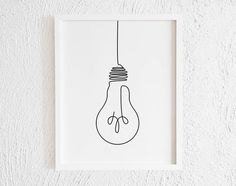 a black and white drawing of a lightbulb hanging from a wire on a wall