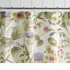 a shower curtain with flowers on it