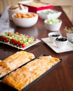 there are many different foods on the table