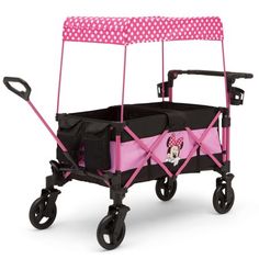 a pink and black wagon with minnie mouse on it