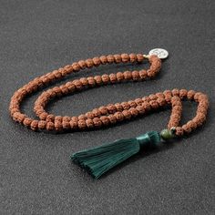 Handcrafted 108 Sacred Rudraksha Seeds With Silk Tassel, Silver Toned Om Charm And Jade Guru Bead Meditation Mala. Will Be Energetically Charged By A Reiki Master The Natural And 100% Sustainable Seed Beads Have Amazing Texture And Visual Appeal. Rudraksha Beads Are Known For Their Healing Properties And Protective Powers. According To Ancient Vedic Texts, Rudraksha Beads Are Endowed With Cosmic Powers To Elevate The Soul And Assist On The Path Of Ascension. By Meditating With A Rudraksha Mala I Spiritual Silver Beads Mala Gift, Silver Mala With 108 Beads For Meditation, Silver Mala With 108 Beads As Gift, Silver Mala With Round Beads For Meditation, Festival Necklaces With 8mm Beads, Adjustable Silver Traditional Mala, Adjustable Silver Spiritual Mala, Silver Beaded Mala For Festivals, Silver Adjustable Spiritual Mala