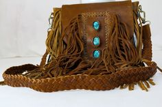 We can’t believe how adorable this bag is!! The turquoise stone with the vintage leather makes for the perfect ‘boho’ look! This bag would go perfect with flares, boots, and a cute graphic tee! This bag has the perfect amount of room for all your necessities without being too much to bear! Length: 12 inches Width: 13 inches Actual product color may vary slightly from the images shown due to the viewing capabilities of different devices Being Too Much, Leather Patterns, Leather Bag Pattern, Cute Graphic Tees, Leather Pattern, Leather Fringe, Boho Look, Turquoise Stone, Leather Working