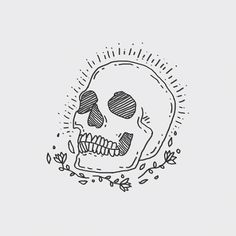 a black and white drawing of a skull