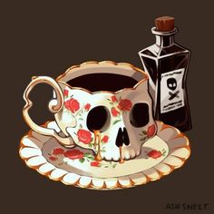 a skull sitting on top of a plate next to a cup and saucer filled with liquid