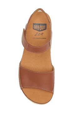 A leather-wrapped platform raises this sandal that offers total comfort with a contoured footbed that targets pressure points to relieve tension and stress. 1 1/2" heel; 1/2"platform (size 39) Adjustable hook-and-loop strap Zen footbed massages pressure points as you walk to relieve stress in the muscles and increase circulation Leather upper/synthetic lining and sole Made in Spain Women's Shoes Comfortable Leather Slingback Sandals With Wedge Heel, Leather Closed Toe Footbed Sandals With Arch Support, Comfortable Leather Slingback Wedge Sandals, Brown Slingback Sandals With Arch Support And Round Toe, Comfortable Leather Slingback Sandals With Platform, Comfortable Leather Heels With Ortholite Insole, Brown Leather Platform Sport Sandals, Comfortable Leather Heels With Arch Support, Brown Sport Sandals With Arch Support And Open Toe