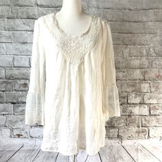 Oh Gussie! Romantic Cream Blouse Beautiful Flowy Lace Sleeves Size Medium Bust 38” Length 27/28” Measurements Are Approximate Rayon Polyester Blend Bohemian Blouse With Lace Trim And Relaxed Fit, Flowy Lace Bohemian Blouse, Fitted Casual Peasant Top With Lace Trim, Casual Lace Blouse For Vacation, Casual Long Sleeve Lace Top For Beach, Spring Tunic Blouse With Lace Trim, Romantic Blouses, Cream Blouse, Lace Sleeves