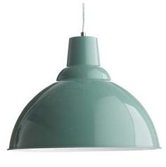 a green pendant light hanging from a ceiling