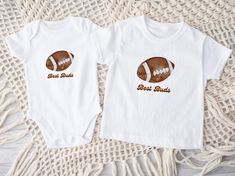 Matching father son football shirts, matching brother football shirts. Adult, kid and baby sizes in black or white shirts. Great Father's Day gift or gift for new dad. Game day shirts for the whole family.     Items are sold separately. Order multiple sizes from one listing. Options for baby, toddler, youth, and adult sizes (see below).  SHIRT SIZING: Please refer to size charts. All shirts are unisex. -Baby bodysuit (Rabbit Skins 4400): Sizes newborn - 24 month -Toddler t-shirt (Bella Canvas 30 Sibling Football Shirts, White Family Matching T-shirt With Team Name, Football Shirts For Brother, Toddler Football Shirts, Little Brother Football Shirt, Family Matching Pre-shrunk T-shirt For Father's Day, Son Football, Gift For New Dad, Gifts For New Dads